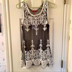 Laced flowy sleeveless blouse